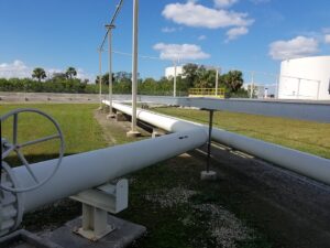 Pipes splitting off in field at MacDill AFB.