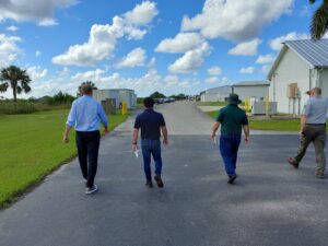 Group walking on site visit to project area.